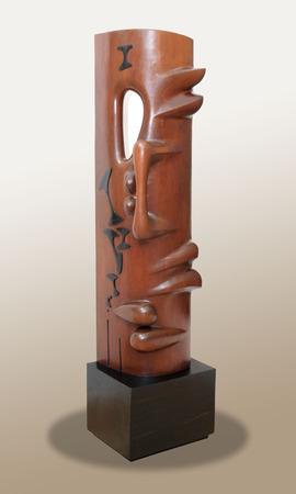 AGUST�N C�RDENAS (1927�2001)<br>
Floral Column II<br>
<i>(Columna de Flor II),</i> 1974<br>
mahogany and ebony one-of-a-kind sculpture<br>
78 x 15 � x 19 � inches
