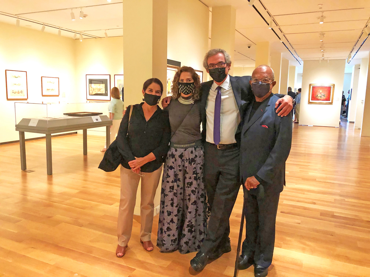Professor Marial Iglesias Utset, Patricia de la Fuente, <br>Professor Alejandro De la Fuente, <br>and Professor Henry Louis 'Skip' Gates enjoying the exhibition. <br><br><br>