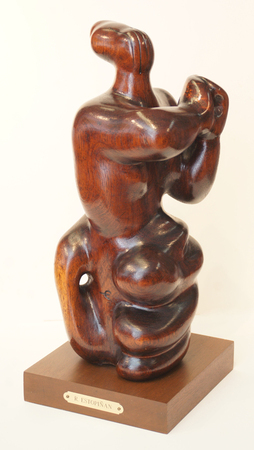 ROBERTO ESTOPIÑÁN<br>
Nude Woman<br>
<i>(Mujer Desnuda)</i><br> ca. 1951<br>
mahogany wood sculpture<br>
18 x 7 1/2 x 7 1/4 inches<br><br>
<i>Provenance:</i><br>
José Gómez Sicre Collection,
Washington, D.C.;<br>
Private Collection, Caracas, Venezuela.<br><br>
<i>Exhibitions:</i><br>
Exhibited at the 2nd Biennial
São Paolo, Brazil, 1952.<br><br>
<i>Illustrations:</i><br>
Illustrated in <i>Noticias de Arte</i>,
October-November 1953.<br><br>
Illustrated in <i>IMPORTANT CUBAN ARTWORKS,<br>
Volume Fourteen</i>, page 76.