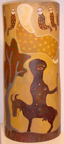 MANUEL MENDIVE (b. 1944) <br>
Eggun and Elegu� <br>
(<i>Eggun y Elegu�</i>), 2004 <br>
acrylic on Royal Palm trunk <br>
32 �  x 13 � x 6 � inches 
